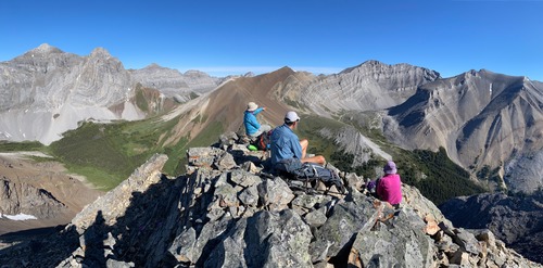 Brock's Peak summit, pointing towards the Spectral Lakes