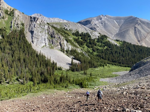 The climb to Spectral Lakes is above the figures 