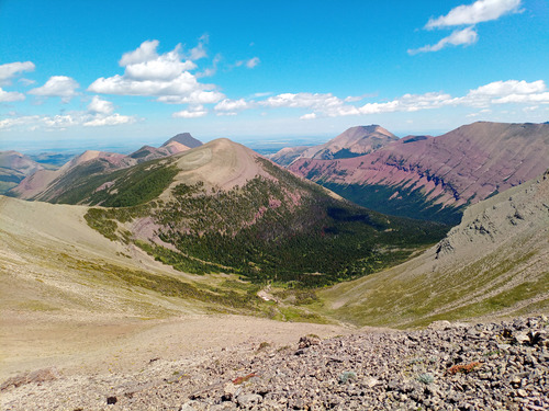 View east from summit of Victoria Ridge. Shell gas plant just visible in the middle "V". Click to enlarge any photo. 