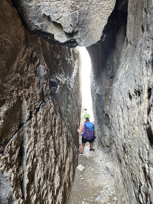 Going through the tunnel, a fun feature on the route to the south summit Going through the tunnel, a fun feature on the route to the south summit