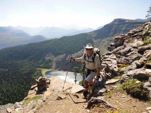 Gary at the top of the scramble section to gain Akamina Ridge near Waterton Park. Forum Lake behind. 