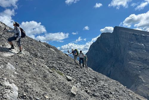 Alda looking for the best route above West Wind Pass (Windtower in bkg)
