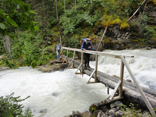 Bob crosses Lambe Creek bridge on GDT in BC