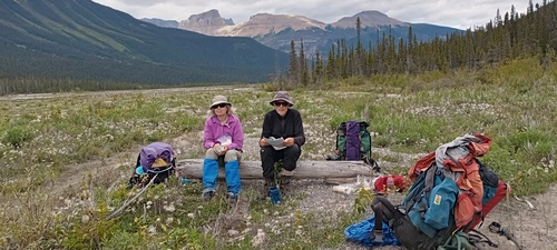 Jane and Bob lunch on the Howse Flood Plain while hiking the GDT section D