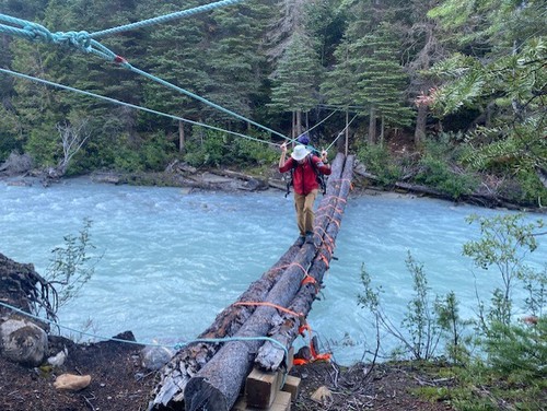 David crosses the Blaeberry River while hiking section D of the GDT