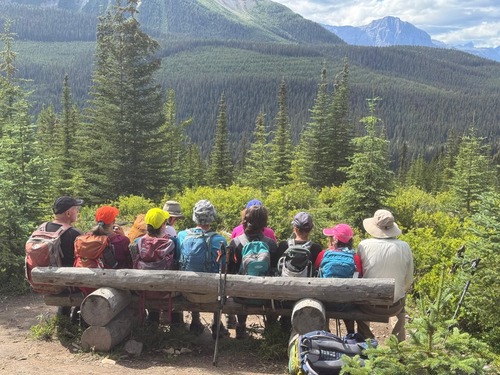 A tight squeeze to fit all the group on the trail bench