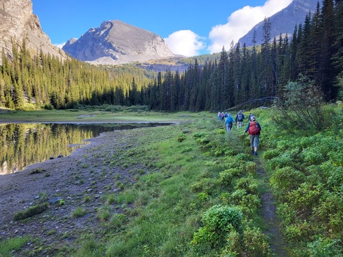 on the trail passing the first lake