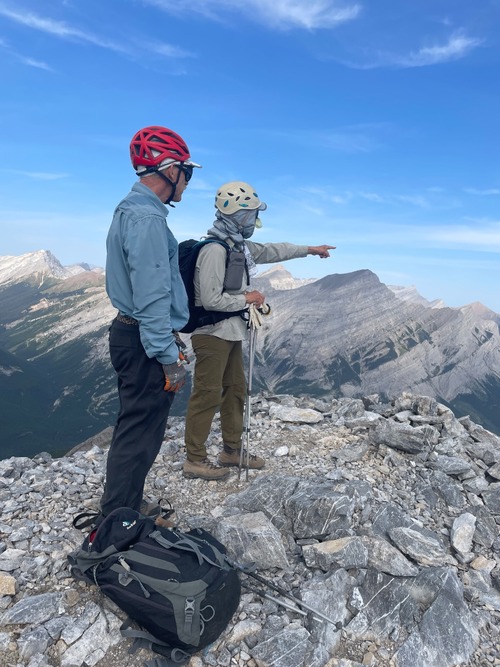 Sim pointing out her next objective to Jack, on the north summit