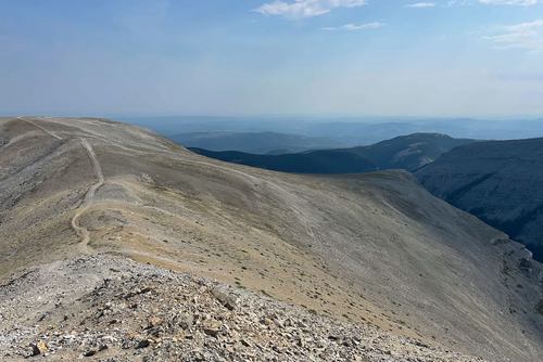 The long trail back (to the right side of the bump at the right)
