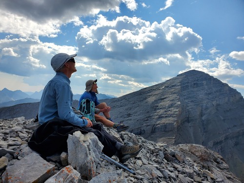 Watching a bald eagle floating above us with nary a flap, from the summit of Garriochmill. Mount Glasgow behind us.