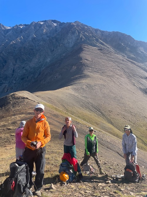 Helmetting up for the scree ascent from Lipsett