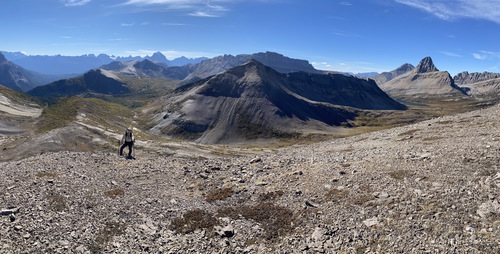 Climbing up Brachiopod Mountain's south ridge with a sea of larches below