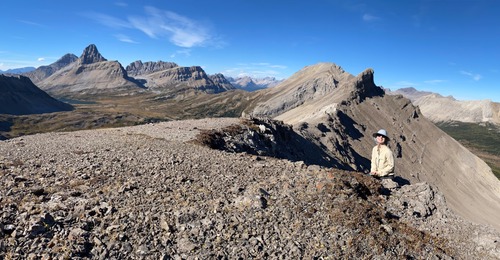 On Brachiopod Mountain's south summit; main summit is pointy thing above Tina's head