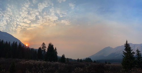 Wildfire smoke blowing in; Cyclone is the peak right of centre 