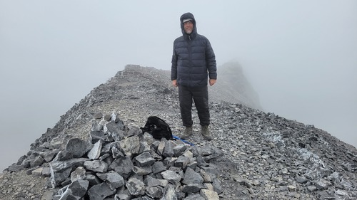 James on the Summit in the clouds