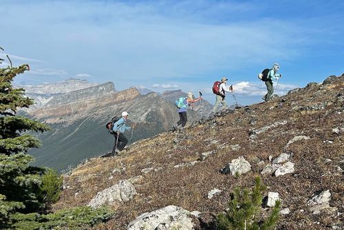 Heading up to Vista Peak (Hungabee, Bident, Boom, Temple and Bell mtns in bkg)