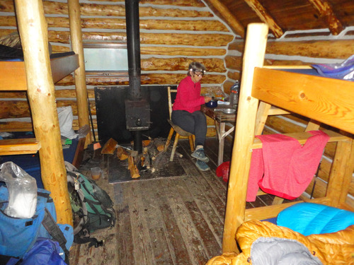 Pat dines in Forget-me-Not Naiset Hut in Assiniboine Provisional Park