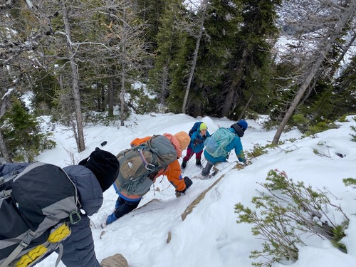 Carefully scrambling down 