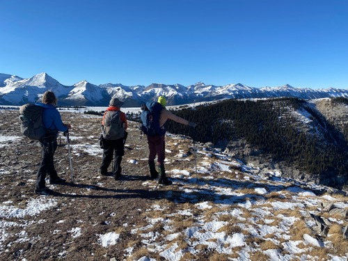 Looking at the normally hidden cliffs on the north summit 