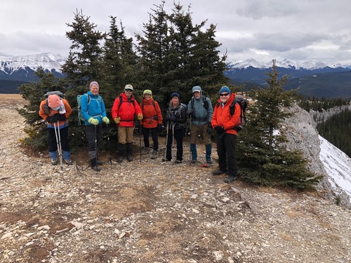 Sheltering from the cold summit wind!