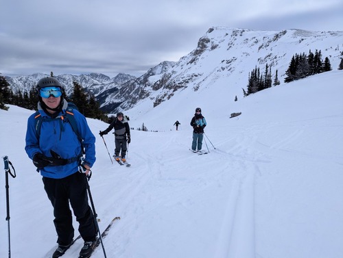 Ian, Clifton, Ivan and Janice skiing up slope