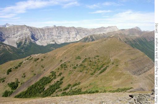 Mt Lipsett NW summit (2,535m) with Grizzly-Highwood Ridges and Elk Range in the background
