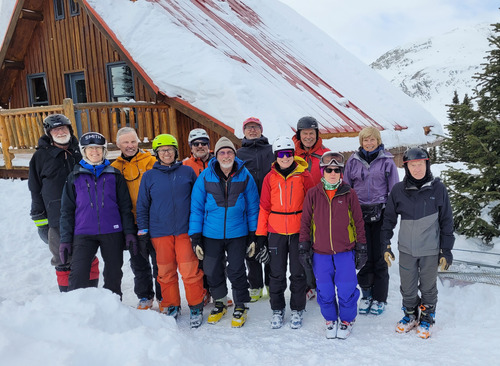 happy ramblers in front of the lodge