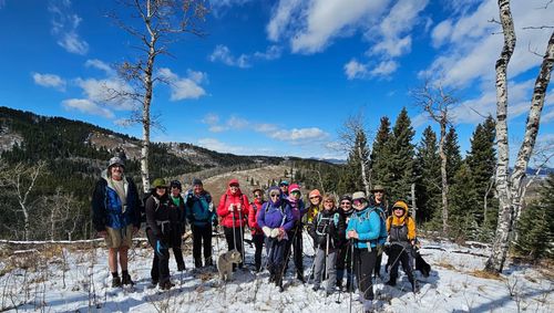 Group of hikers on the shoulder of Muley ridge