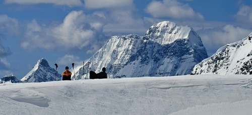 Taking a break on the Haig Glacier, the Royal Group behind us.