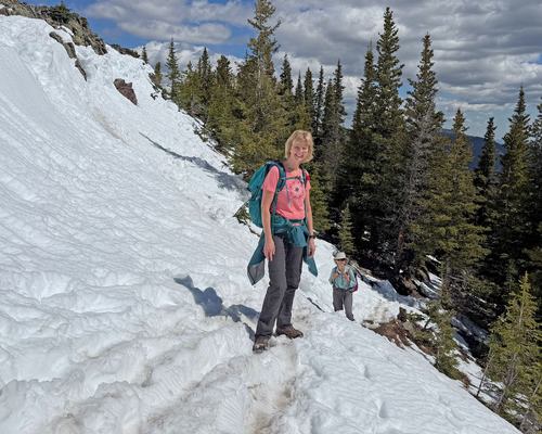 Mechtild in the standard snow drift where the trail ascends to Powderface Ridge