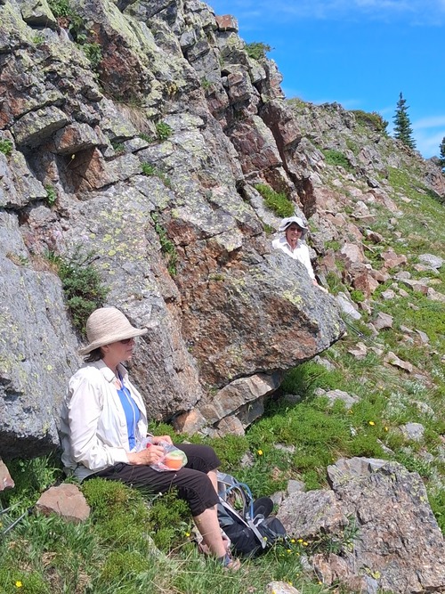 Sarah & Barb at lunch sheltered from the wind.