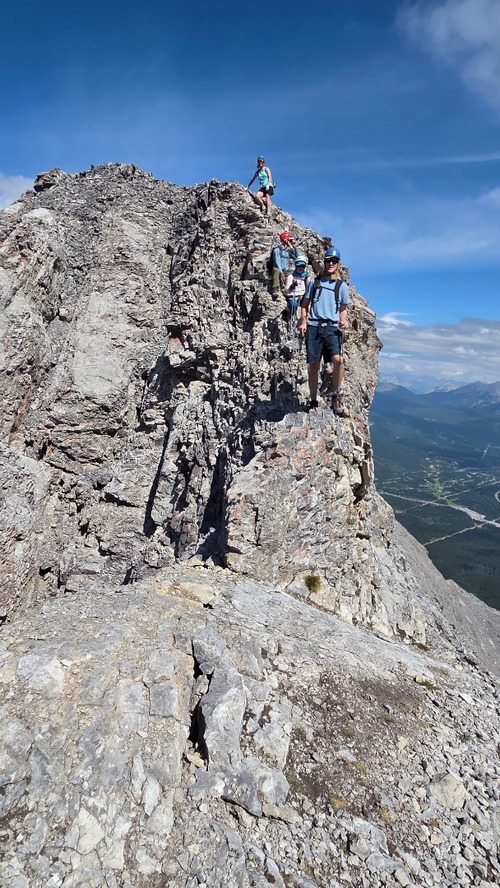 Nearing the narrow exposed section between the north and south peak. Matt walked across it, while I admit, I bear-crawled.