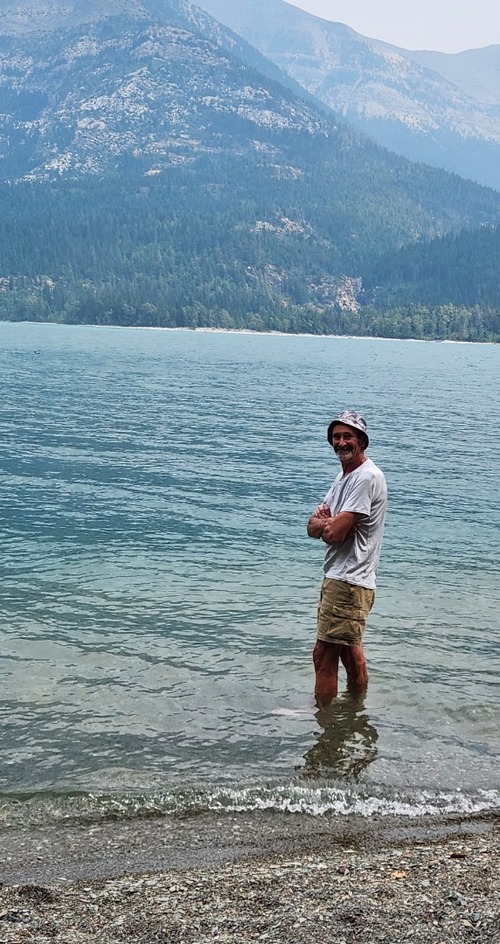 Wading at one of several beaches along the trail