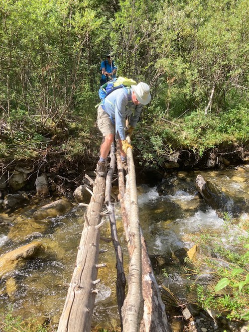 Philip gingerly crossing Prairie Ck