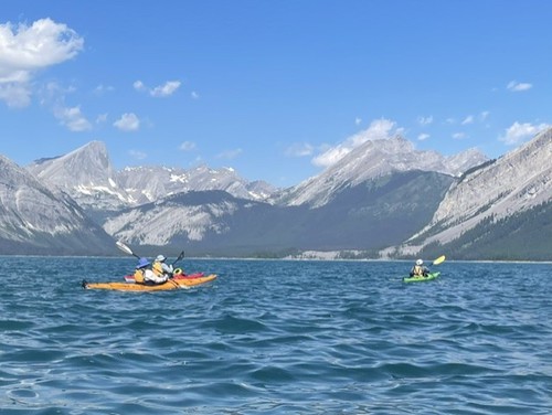 Brenda, Daryl and Dave paddling the open part of the lake with waves starting to build up 