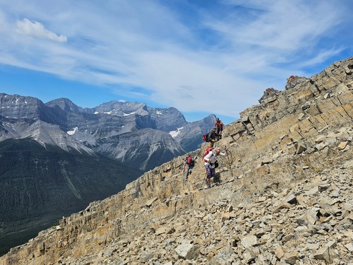 Steep, rocky, reasonable footing on ascent to summit. 