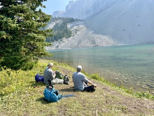 Photini and Dave enjoying a brief break on the shores of Chester Lake 