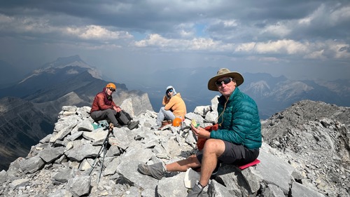 Summit lunch in a pocket of sunshine