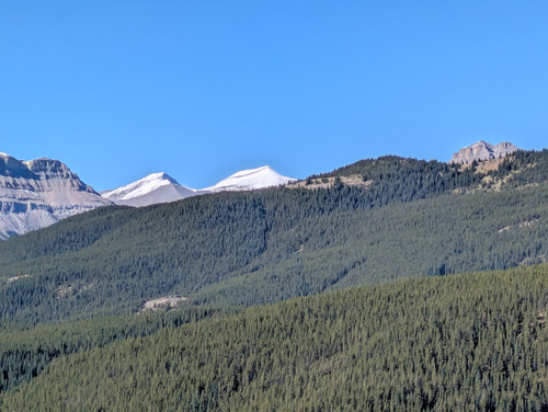 Snowy peaks peeking over Surveyors Ridge to the west
