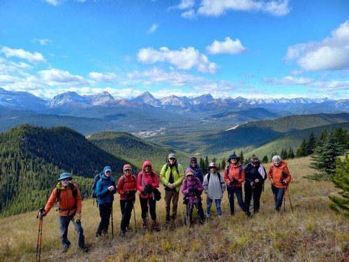 Enduring the cold wind on the high point of the ridge