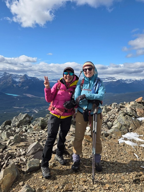 On the summit of Lipalian Mountain, Lake Louise in the background.