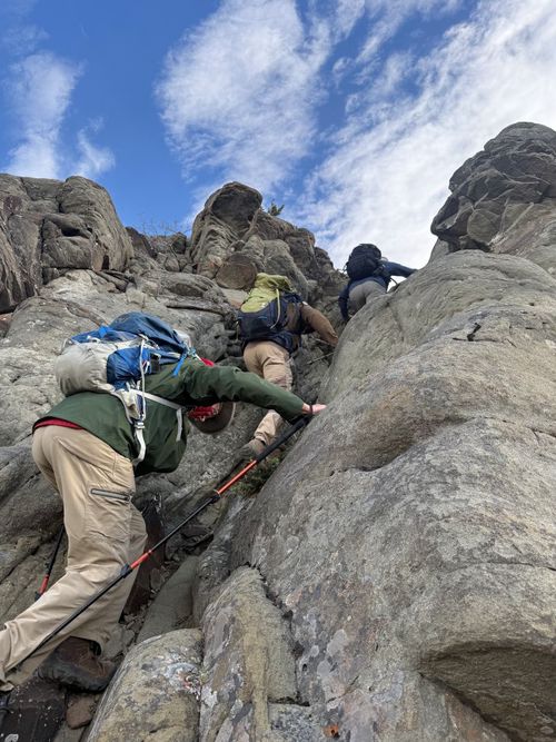 Doing the easy scramble up the rock outlier