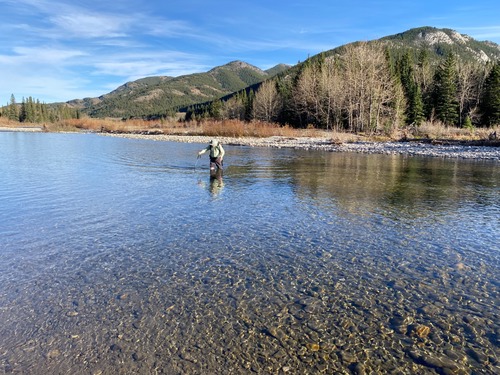 Recrossing the river in much warmer conditions; ascent route on the right and descent at left