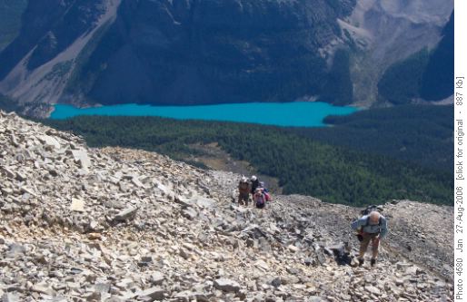 Ramblers climbing Eiffel Peak with Moraine Lake in the background