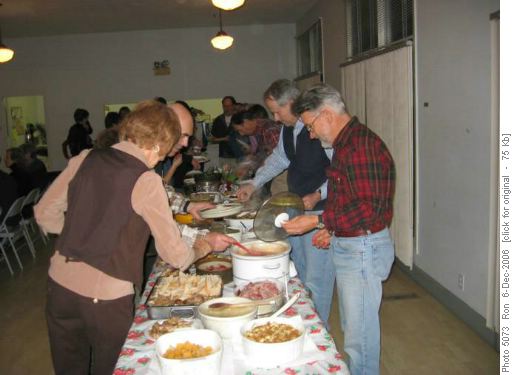 At the food line: Christmas pot luck