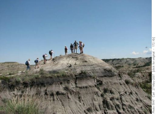 Summiting a badlands knoll