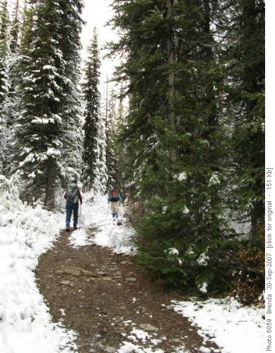 The trail becomes snow covered as we near the lake