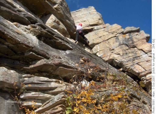 Evelyn climbing at Yam Bluffs