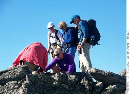 Trying to unjam a pack strap: lots of supervisors