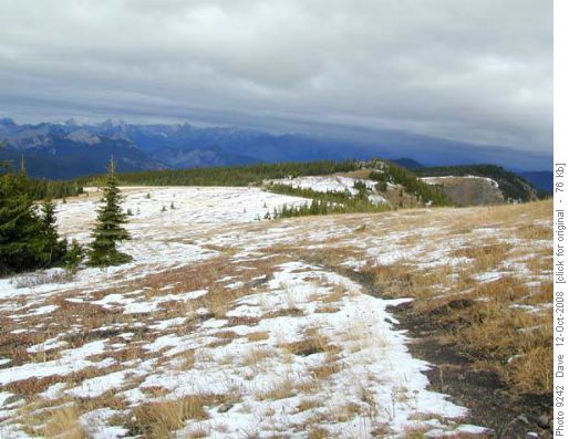Ridge north toward Cox Hill with descending storm front